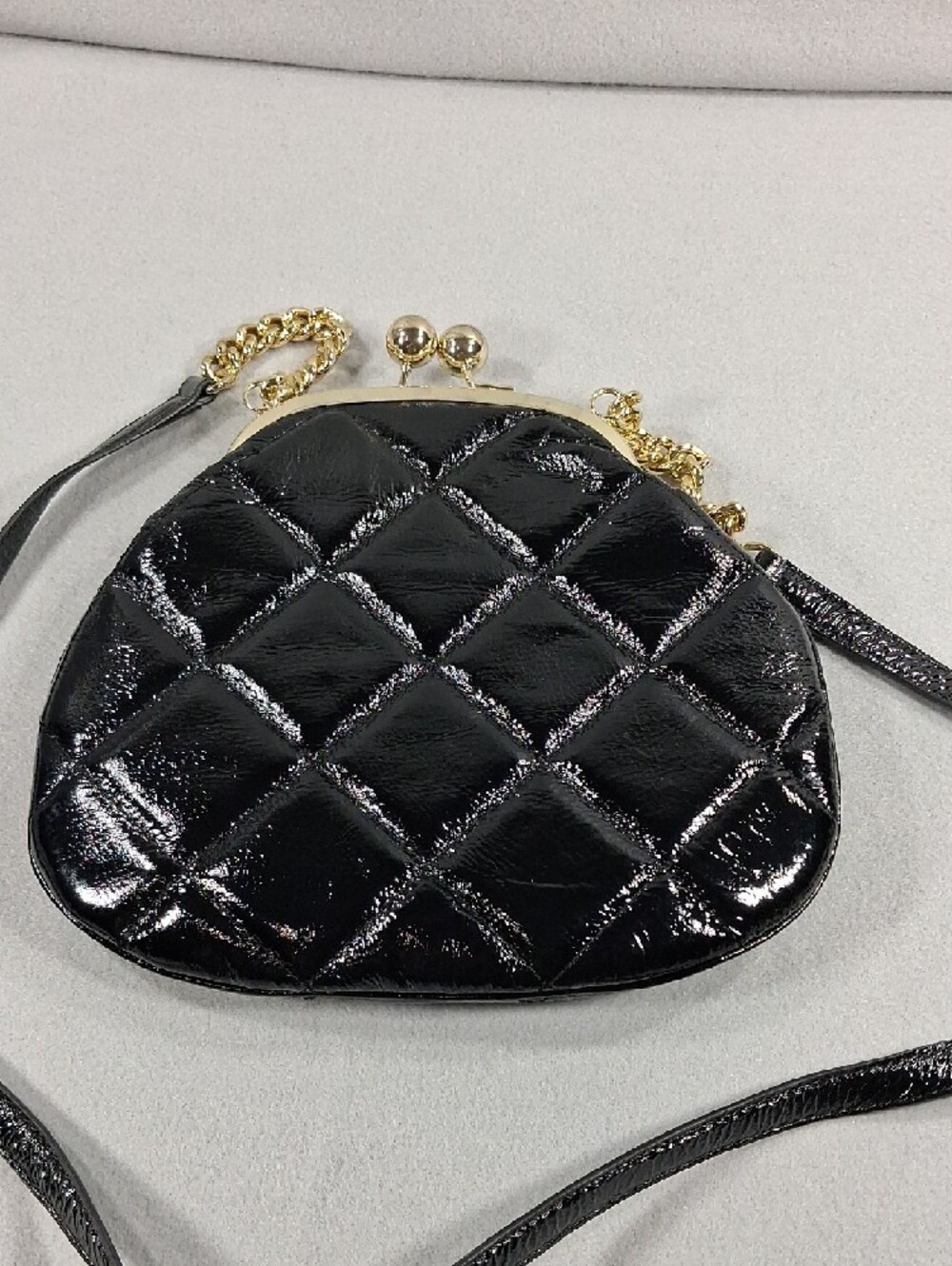 Black Quilted Crossbody Bag with Gold Accents - Picture 3 of 6